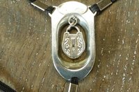 BDSM Clitoral Restraint with Padlock Charm.