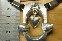 BDSM Clitoral Restraint with Heart and Hands.