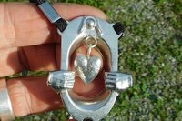 BDSM Clitoral Restraint with Heart and Hands.
