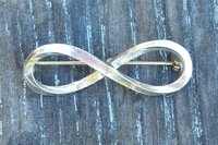 Infinity Loop Brooch. Hand Cast Pewter.