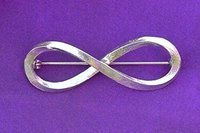 Infinity Loop Brooch. Hand Cast Pewter.