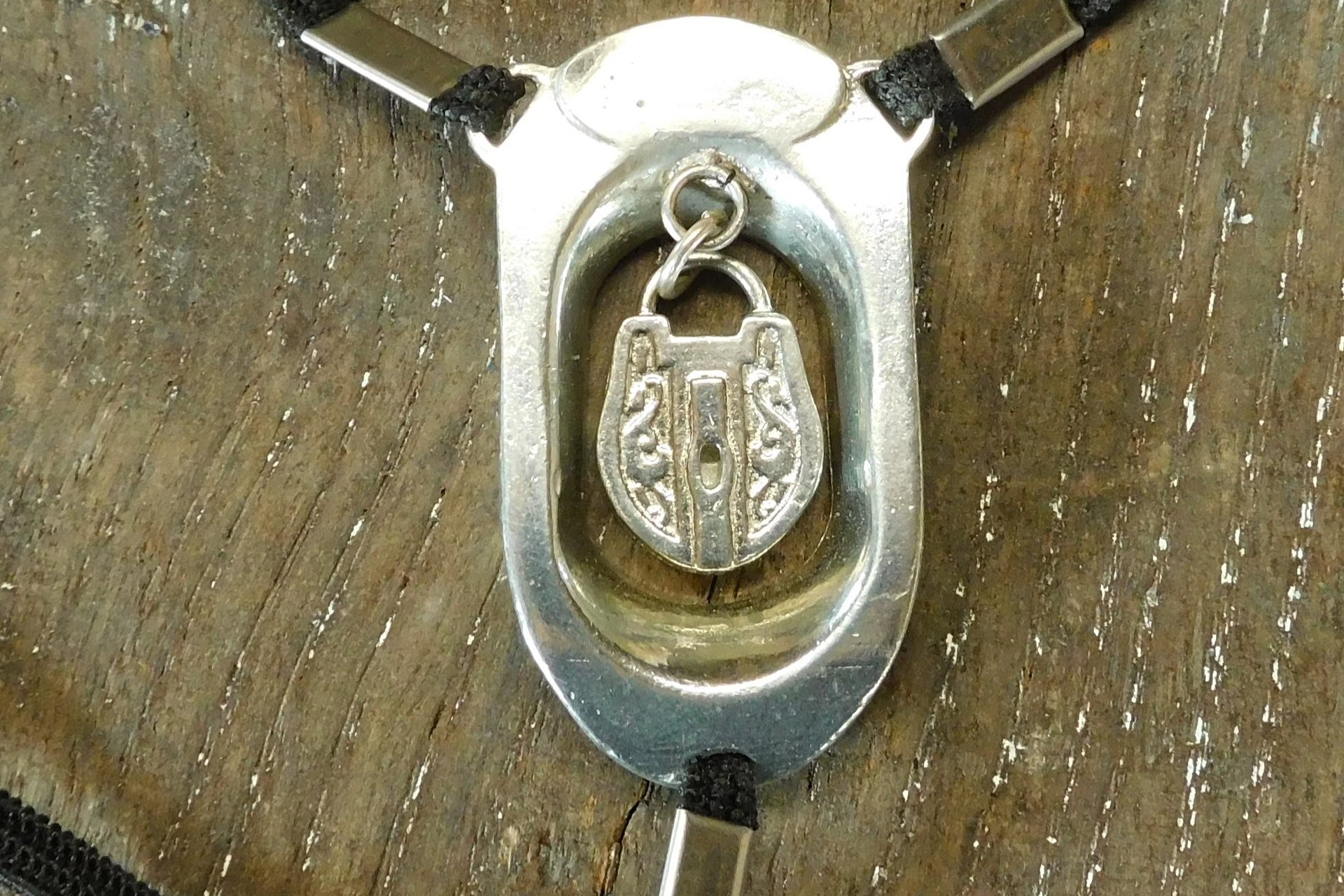 BDSM Clitoral Restraint with Padlock Charm.