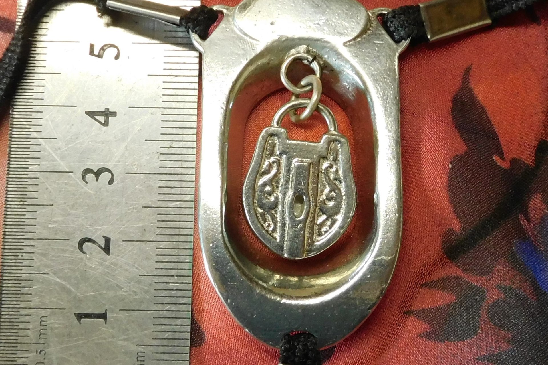 BDSM Clitoral Restraint with Padlock Charm.