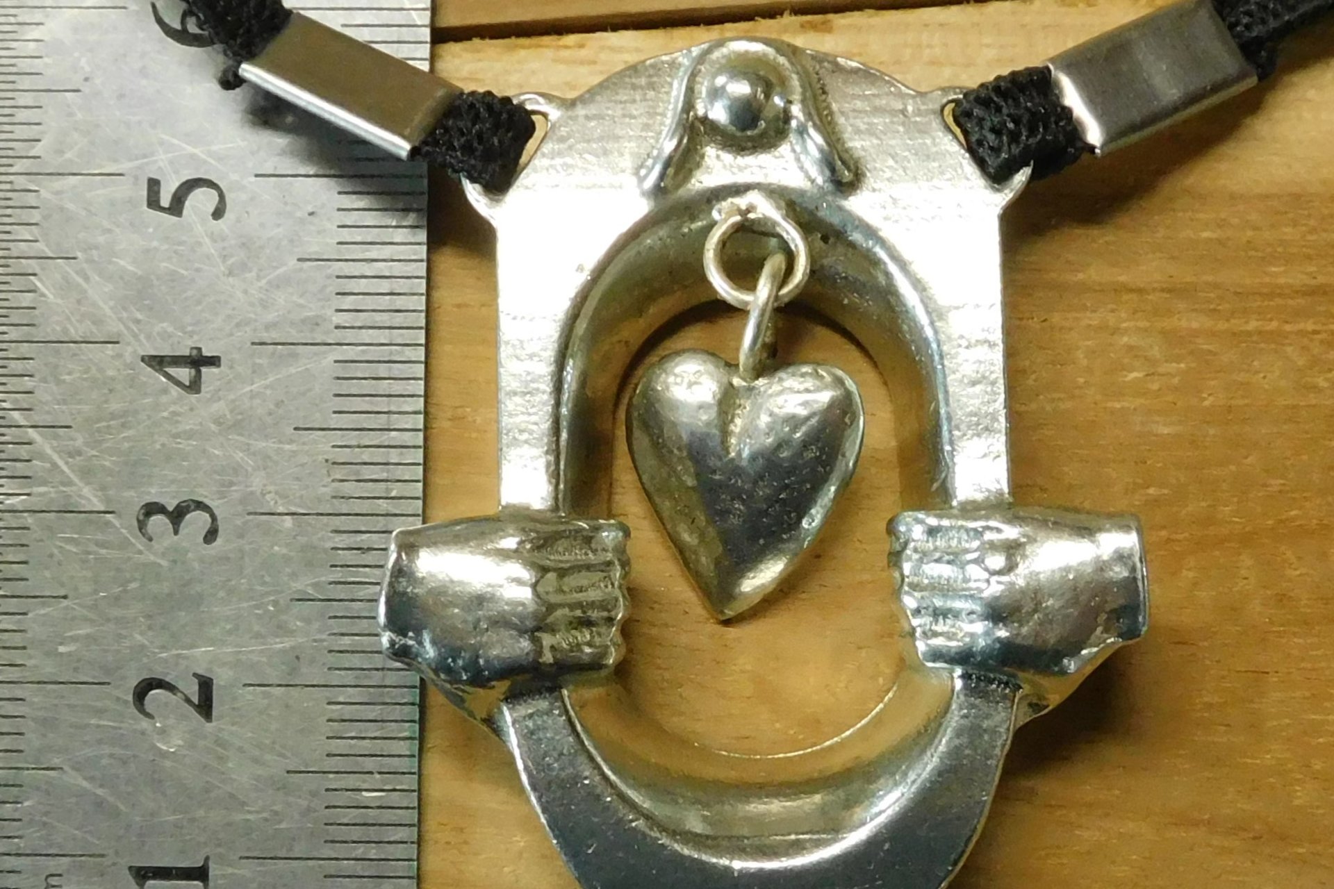 BDSM Clitoral Restraint with Heart and Hands.