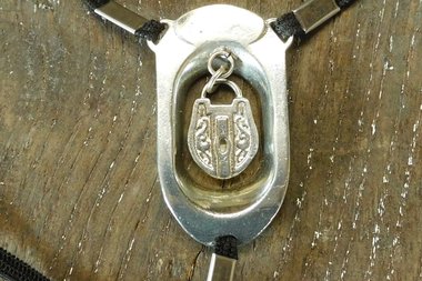 BDSM Clitoral Restraint with Padlock Charm.